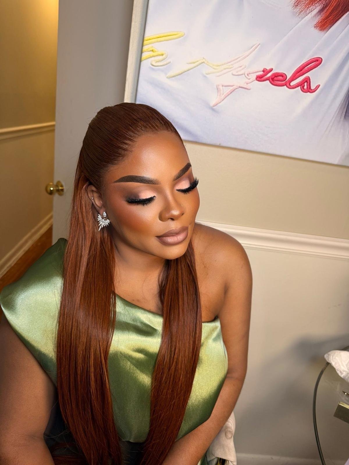 Soft glam with a sleek copper ponytail