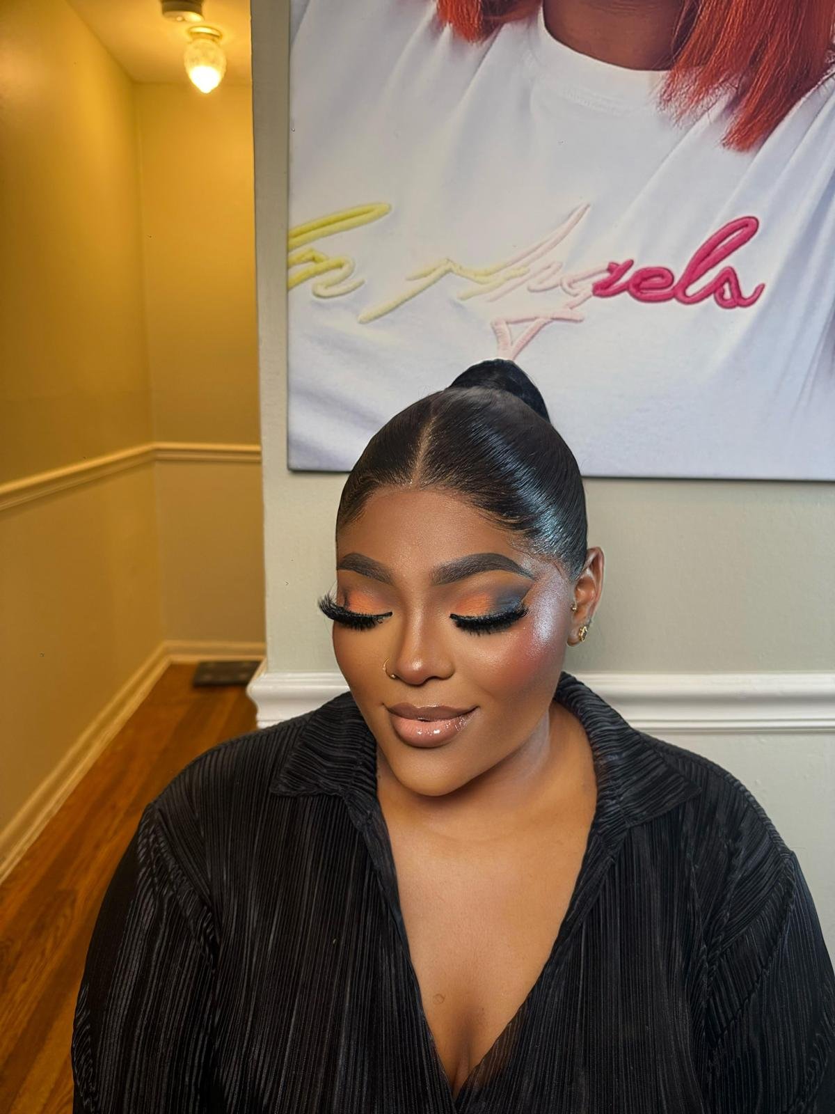 Sleek high ponytail with sunset glam