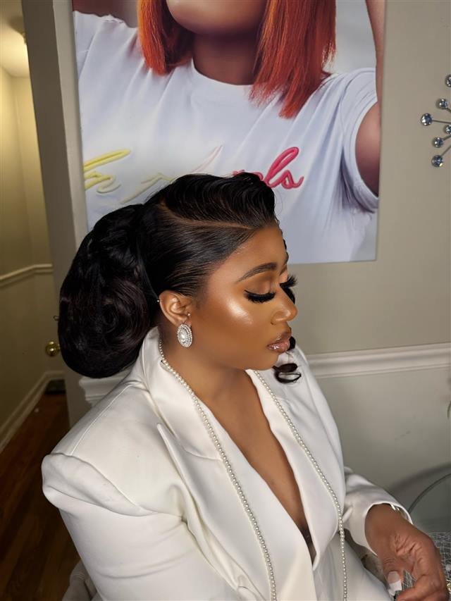 Vintage pin-curl updo with bold glam